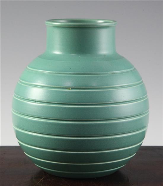 Keith Murray for Wedgwood. A celadon green glaze globular vase, 15.2cm (6in.)